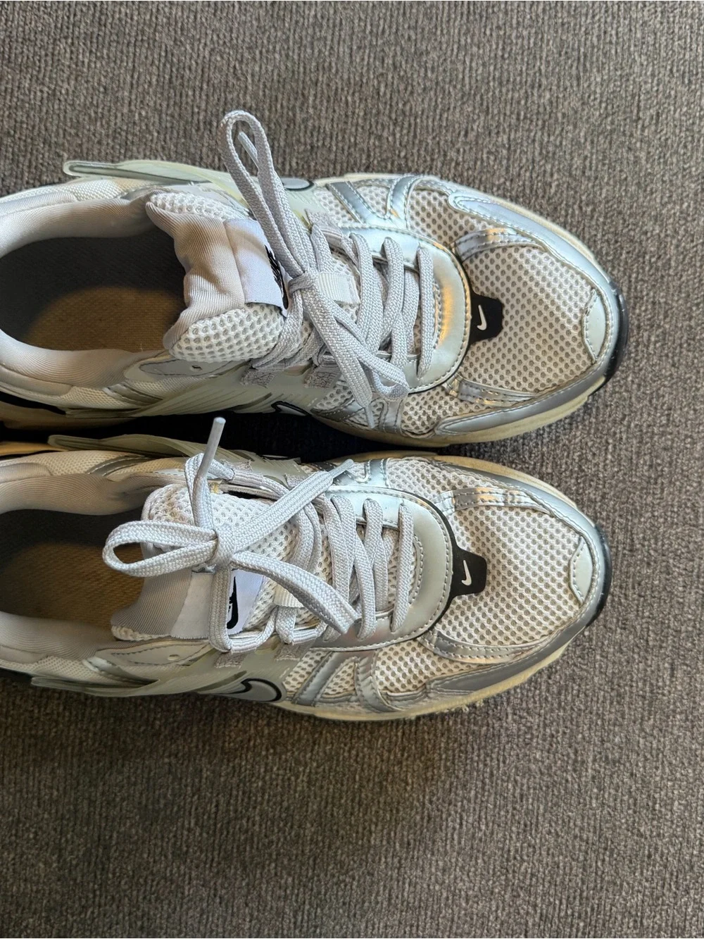 Nike women’s White Silver and Black Athletic Sneakers